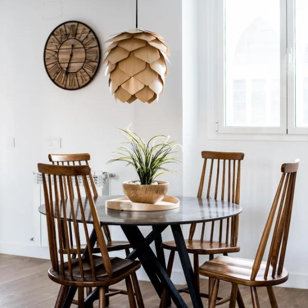 4 seater wooden dining table with a wooden design chandelier